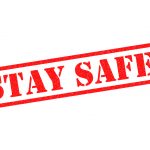 A red stamp saying stay safe