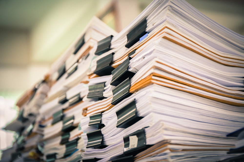 Stacks of papers detailing HSE's guidelines